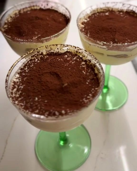 Traditional tiramisù served in coupe glasses